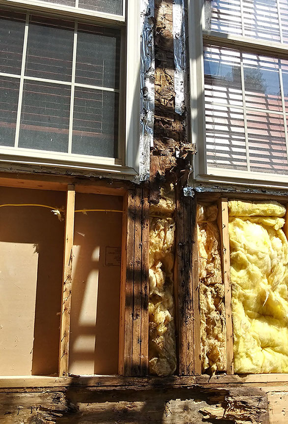 rotted wood around windows as a result of stucco failure